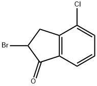 2-BROMO-4-CHLORO-2,3-DIHYDRO-1H-INDEN-1-ONE