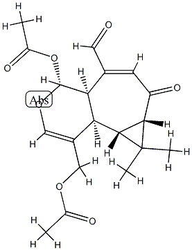 (4R)-4-Acetoxy-1-acetoxymethyl-4aα,7,7aβ,8,8aβ,8bα-hexahydro-8,8-dimethyl-7-oxo-4H-cyclopropa[3,4]cyclohepta[1,2-c]pyran-5-carbaldehyde