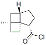 Tricyclo[4.3.0.01,4]nonane-9-carbonyl chloride, 4-methyl-, (1S*,4alpha,6beta,9alpha)- (9CI)