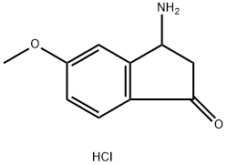 3-Amino-2,3-dihydro-5-methoxy-1H-inden-1-one hydrochloride